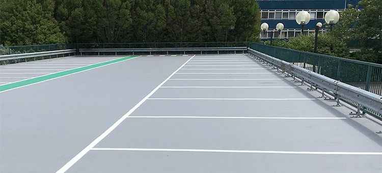 Triflex Solutions for failing asphalt: Multi-storey car park decks and ramps - Triflex PMMA systems